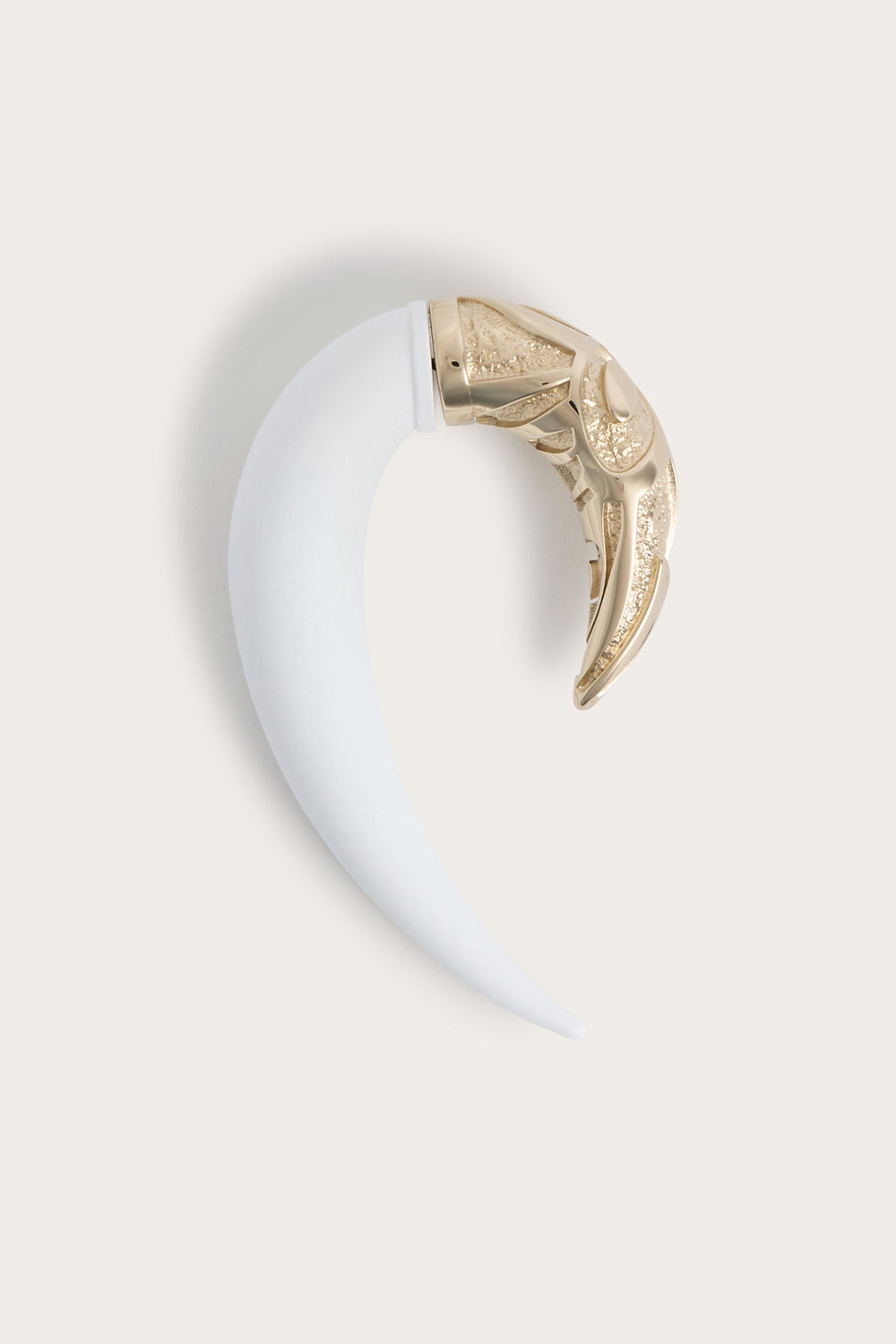 Horn-Shaped Earring
 WOMAN Pucci