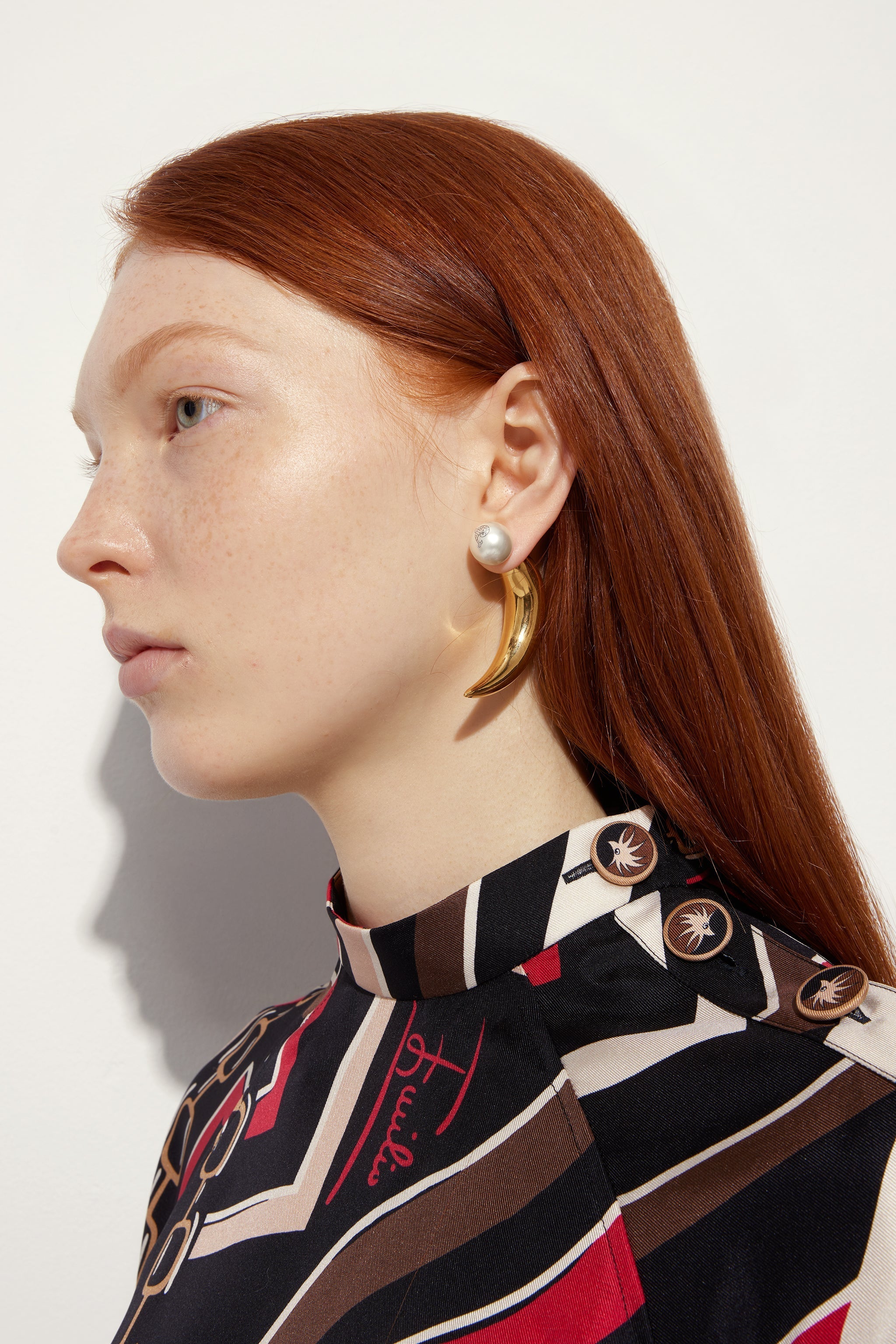 Horn Earrings with Pearl
 WOMAN Pucci