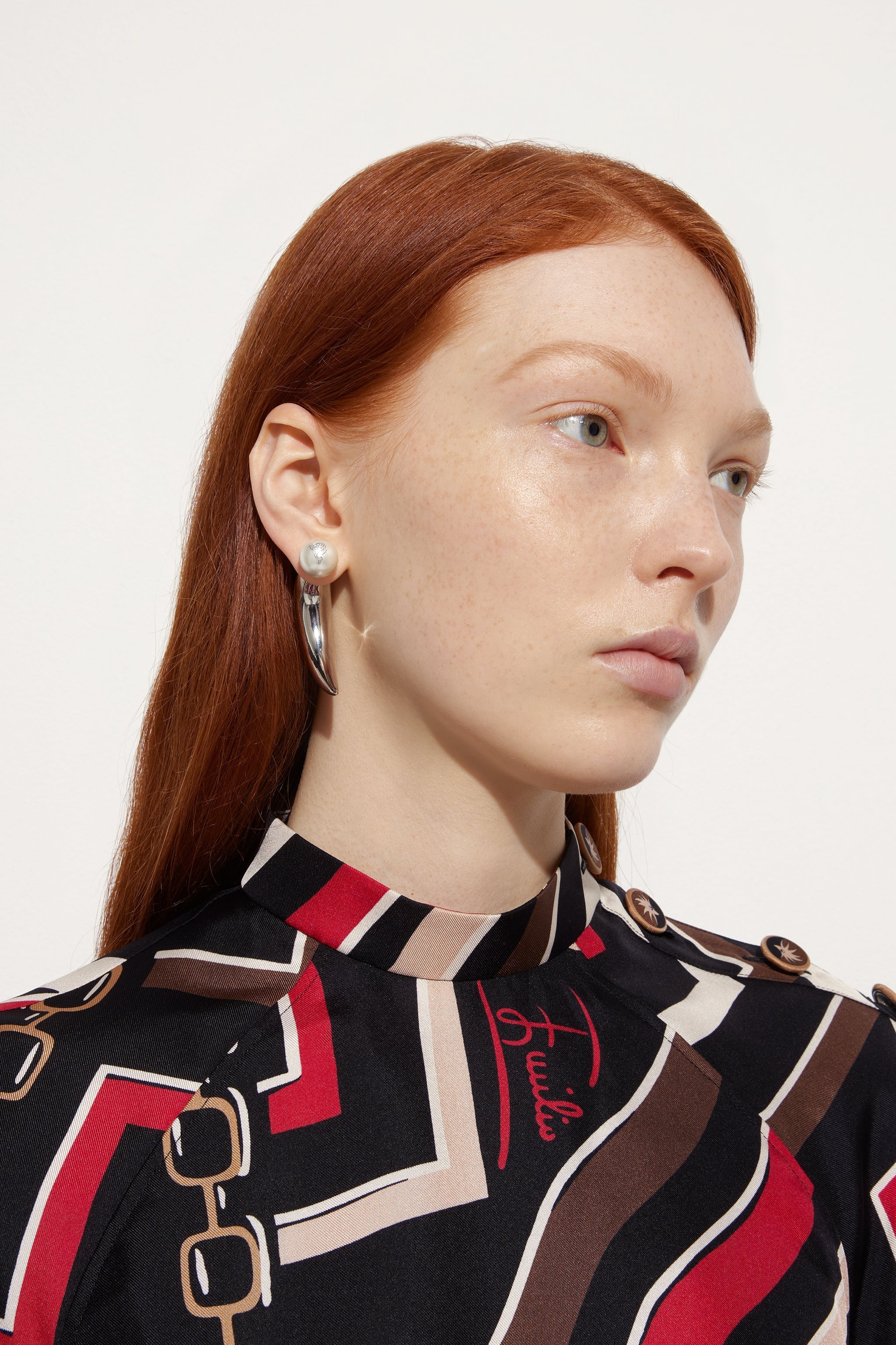Horn Earrings with Pearl
 WOMAN Pucci