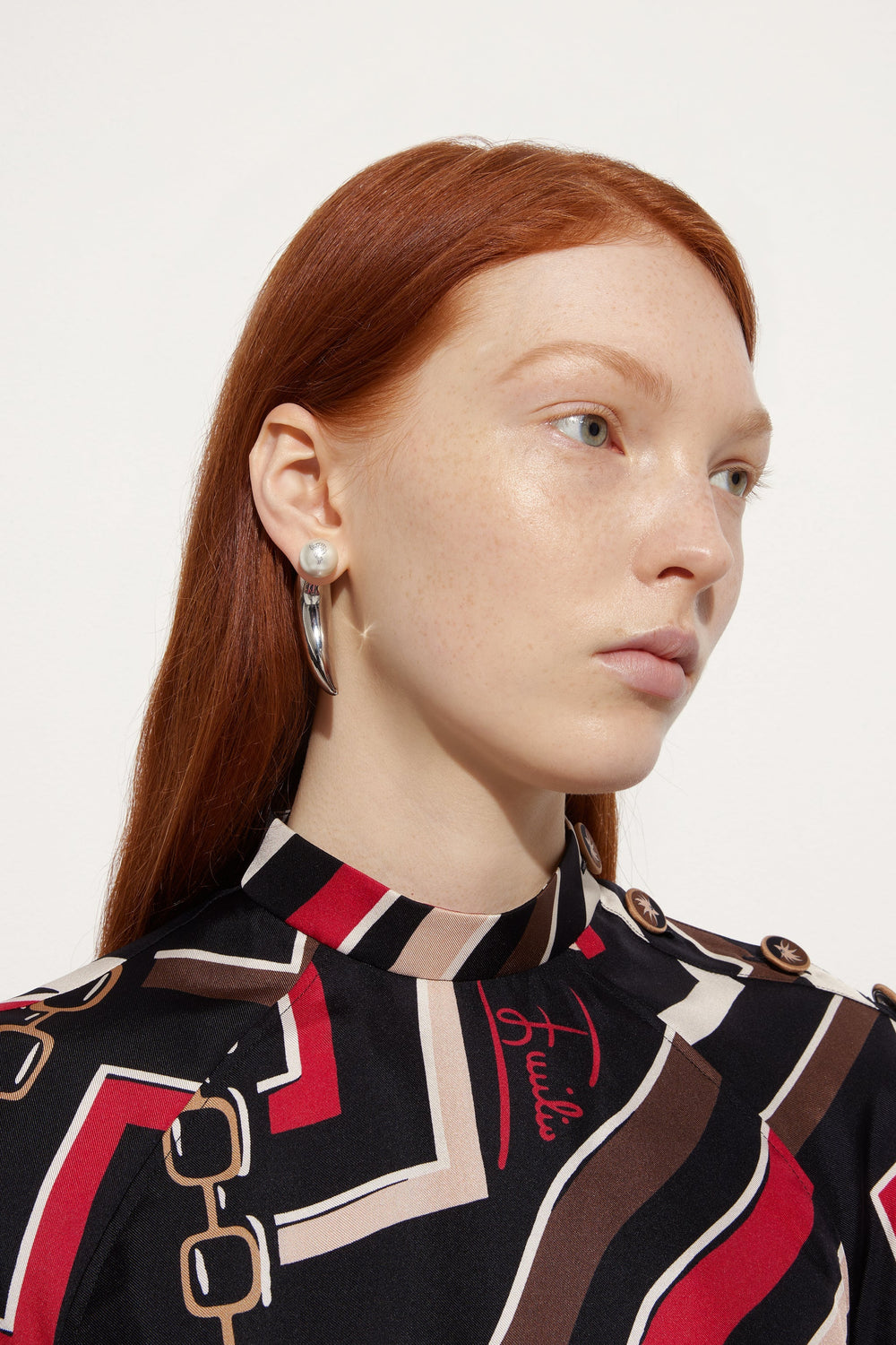 Horn Earrings with Pearl
 WOMAN Pucci