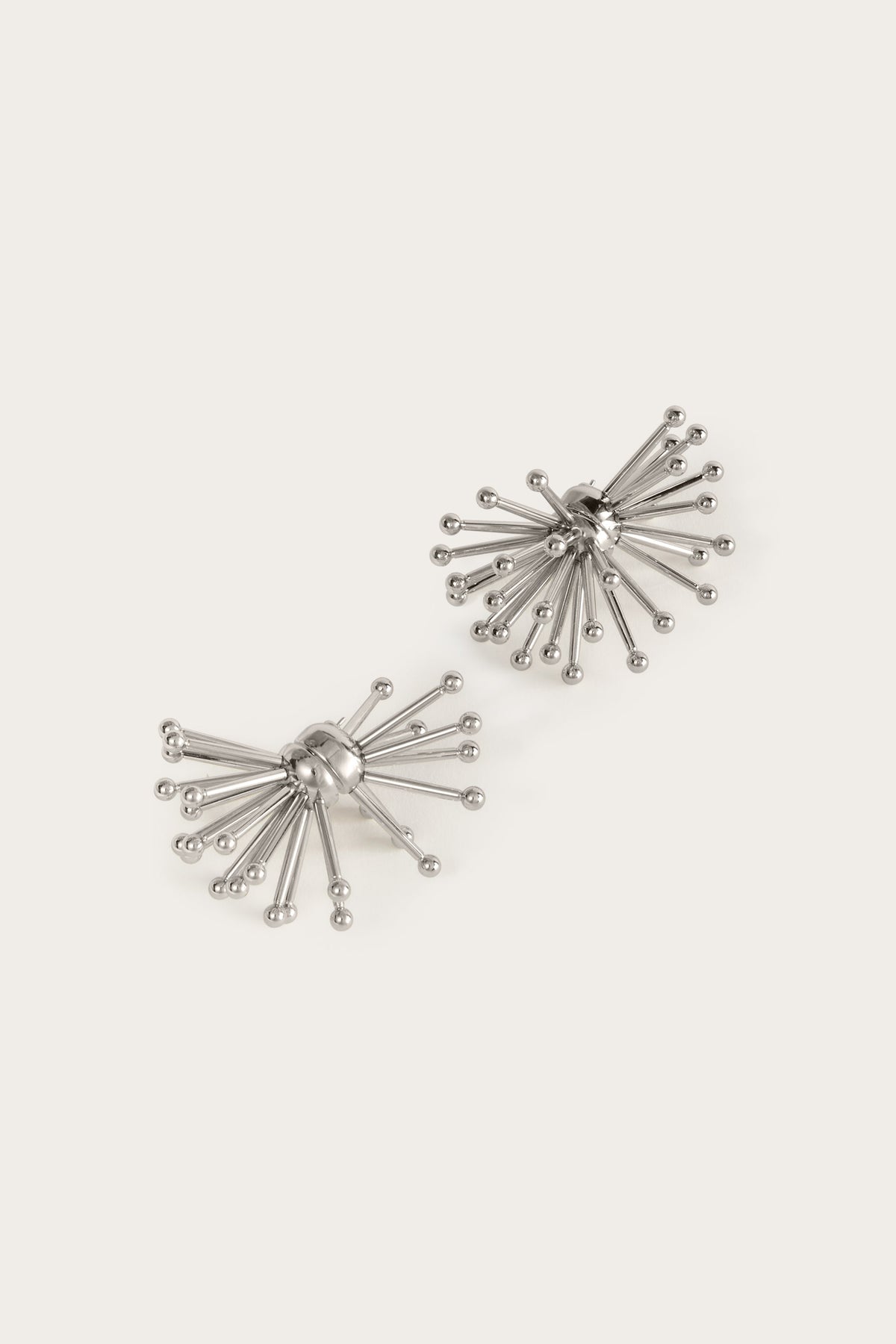 Riccio Earrings
 WOMAN Pucci