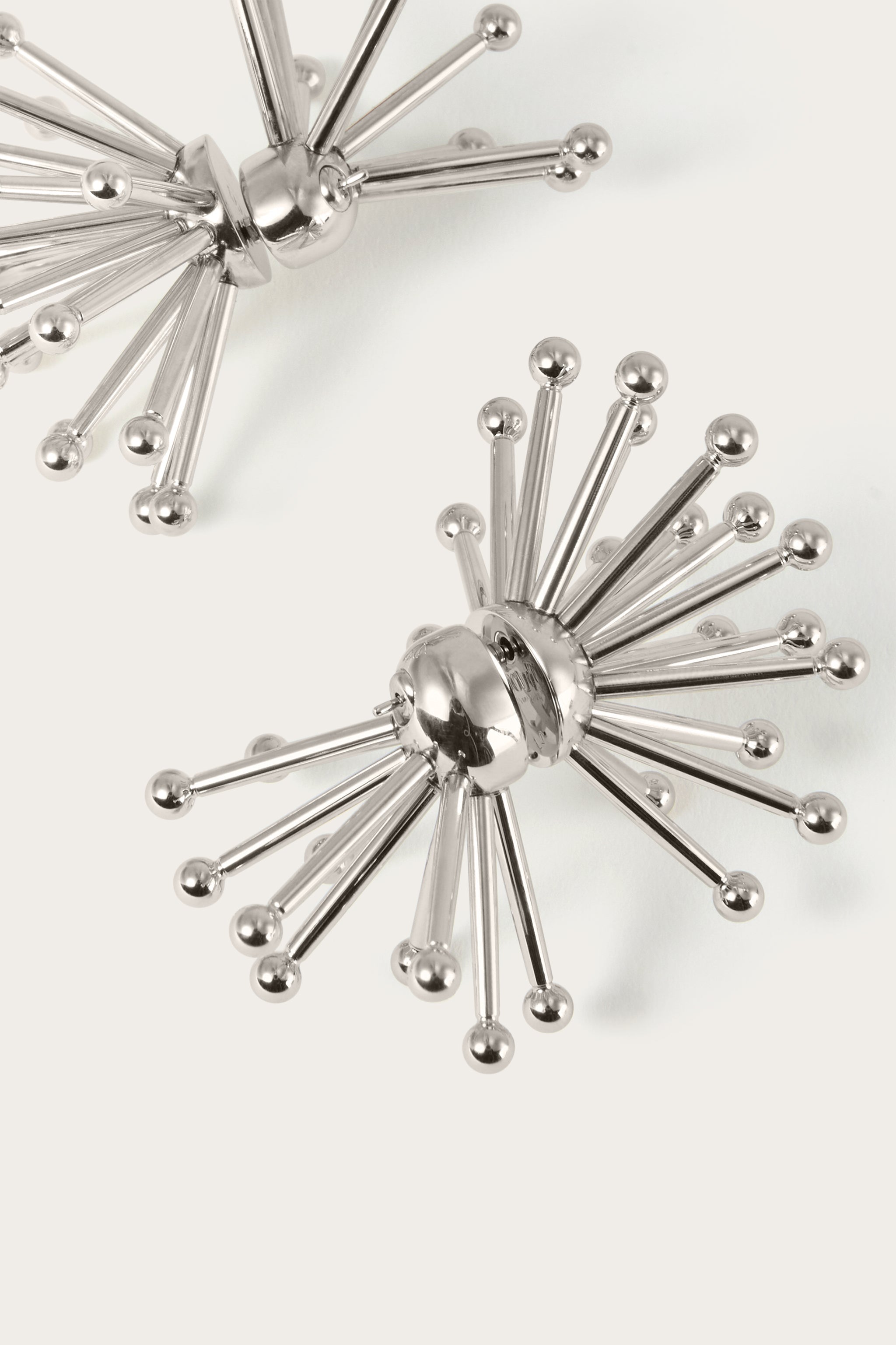 Riccio Earrings
 WOMAN Pucci